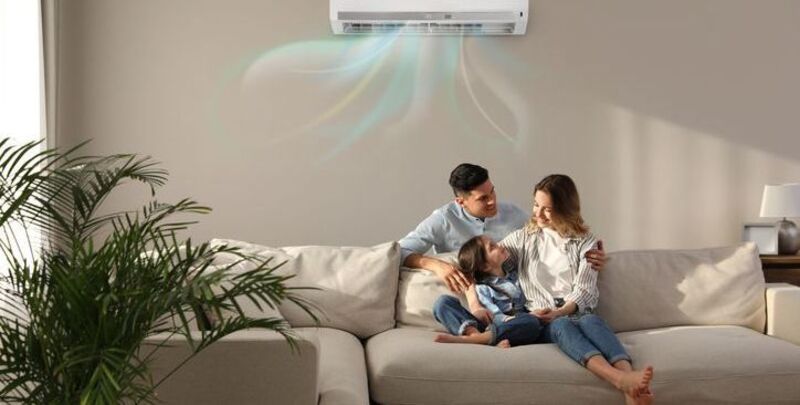 A family enjoying the air conditioning